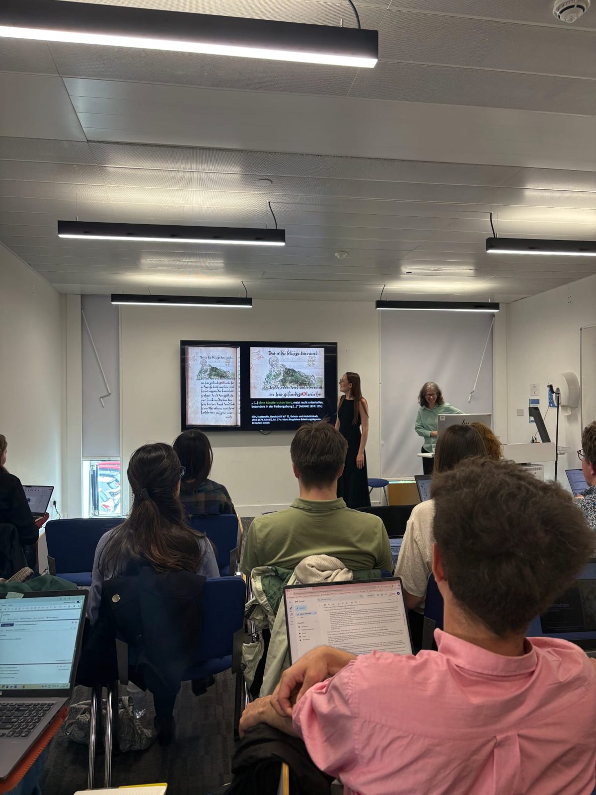 Participant presenting research during the Training School